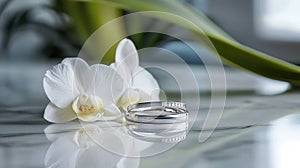 modern wedding rings on table