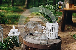 Various decor items at a wedding venue decorated for a stylish boho wedding
