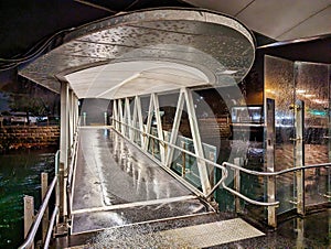 Modern Wharf Access ramp at Night in Rain