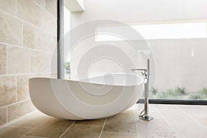 Modern white bathtub