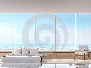 Modern white bedroom with sea view 3d rendering image.There are large window overlooks to sea view. photo