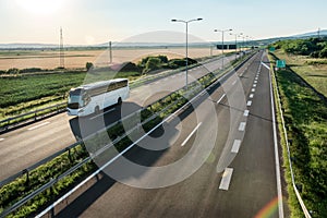 Modern White bus on a highway