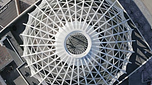 Modern white dome-shaped structure. Stock footage. Top view of beautiful domed structure in modern city. Beautiful domed