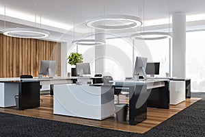 Modern white empty office interior. Work space with computers. 3D render. City view