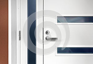 Modern white front door with handle photo