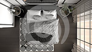 Modern white and gray bedroom in classic room with wall moldings, parquet floor, bed with duvet and pillows, bedside tables,