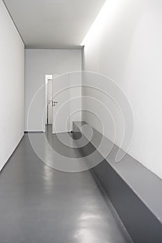 Modern white hallway with doors