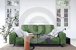 Modern white interior with green sofa