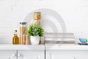 Modern white kitchen interior with breadbox