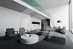 Modern white living room and kitchen corner