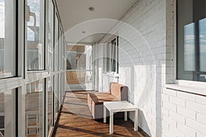 Modern white loggia balcony in a residential building on the top floor