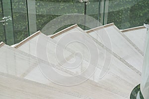 Modern white marble stairs for luxury interior.