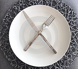 Modern White Plate and Silverware with Place mat