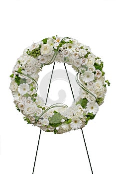Modern White Sympathy Funeral Flower Wreath Form Tribute Made by a Florist in a Flower Shop photo