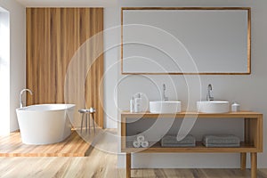 Modern white and wood look bathroom with oval ceramic bathtub