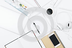 Modern white workspace with empty smartphone