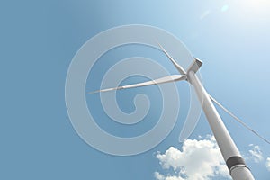 Modern wind turbine against blue sky, low angle view. Energy efficiency