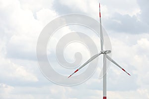 Modern wind turbine against sky, closeup. Alternative energy source