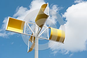 Modern wind turbine made from yellow steel