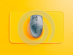 Modern Wireless Computer Mouse on Bright Yellow Mousepad Minimalist Tech Accessory on Vivid Background Contemporary Office photo
