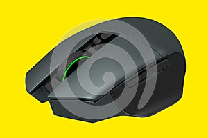 Modern wireless gaming computer mouse isolated on yellow background