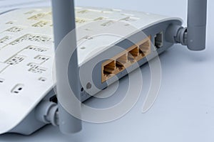 Modern wireless internet router on white background. Wireless routers close-up. Concept of communication and internet,