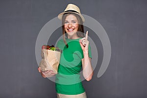 Modern woman holding bio food