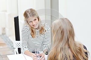 Modern women at coffee shop