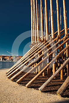 Modern wood art installation in the Arsenale port, Venice, Italy