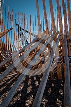 Modern wood art installation in the Arsenale port, Venice, Italy