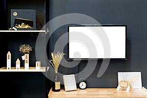 Modern wood shelf with flat TV in living room at home.