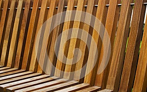Modern wooden bench close up.