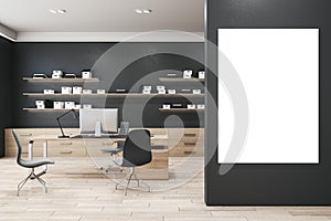 Modern wooden and concrete office interior with empty white mock up banner on wall, furniture, bookshelves with books. Work and