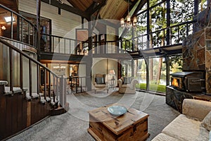 Modern wooden cottage house interior with living room close up photo