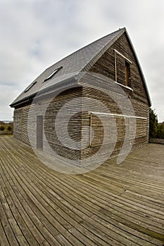 Modern wooden house facade made of horizontal planks