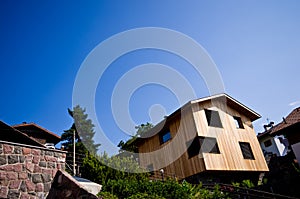 Modern wooden house in Italian Alps