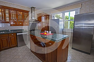 Modern wooden kitchen in a luxury villa