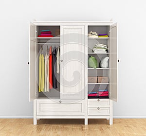 Modern wooden wardrobe with clothes hanging on the rail