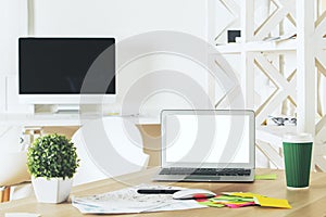 Modern workplace with clean white computer