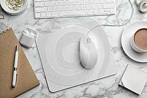 Modern workplace with mouse and keyboard on table, flat lay