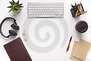 Modern Workplace with office stationery on white background photo