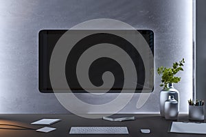 Modern workspace with large computer monitor, desk accessories, and a plant on a dark wooden desk, with a concrete background. 3D