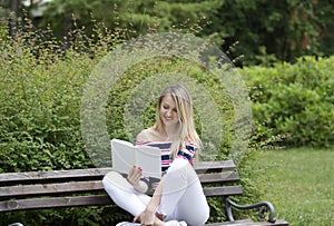 A modern young lady with long hair.She enjoys her free time.