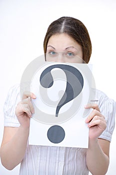 Modern young woman showing a question mark. isolated on white.