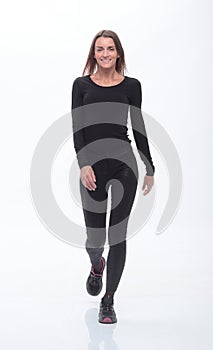 Modern young woman stepping forward.  on white