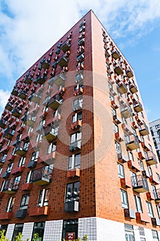 Moderne multy-storey apartment facade of residential building. The view from the top down.