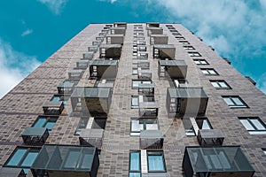 Moderne multy-storey apartment facade of residential building. The view from the top down.