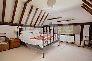 Modernised 17th century cottage interior bedroom