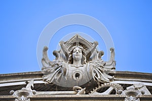 Modernist carved stone details on the facade of Modernist building in Cartagena