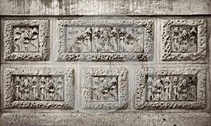 Modernist flowers carving in stone wall